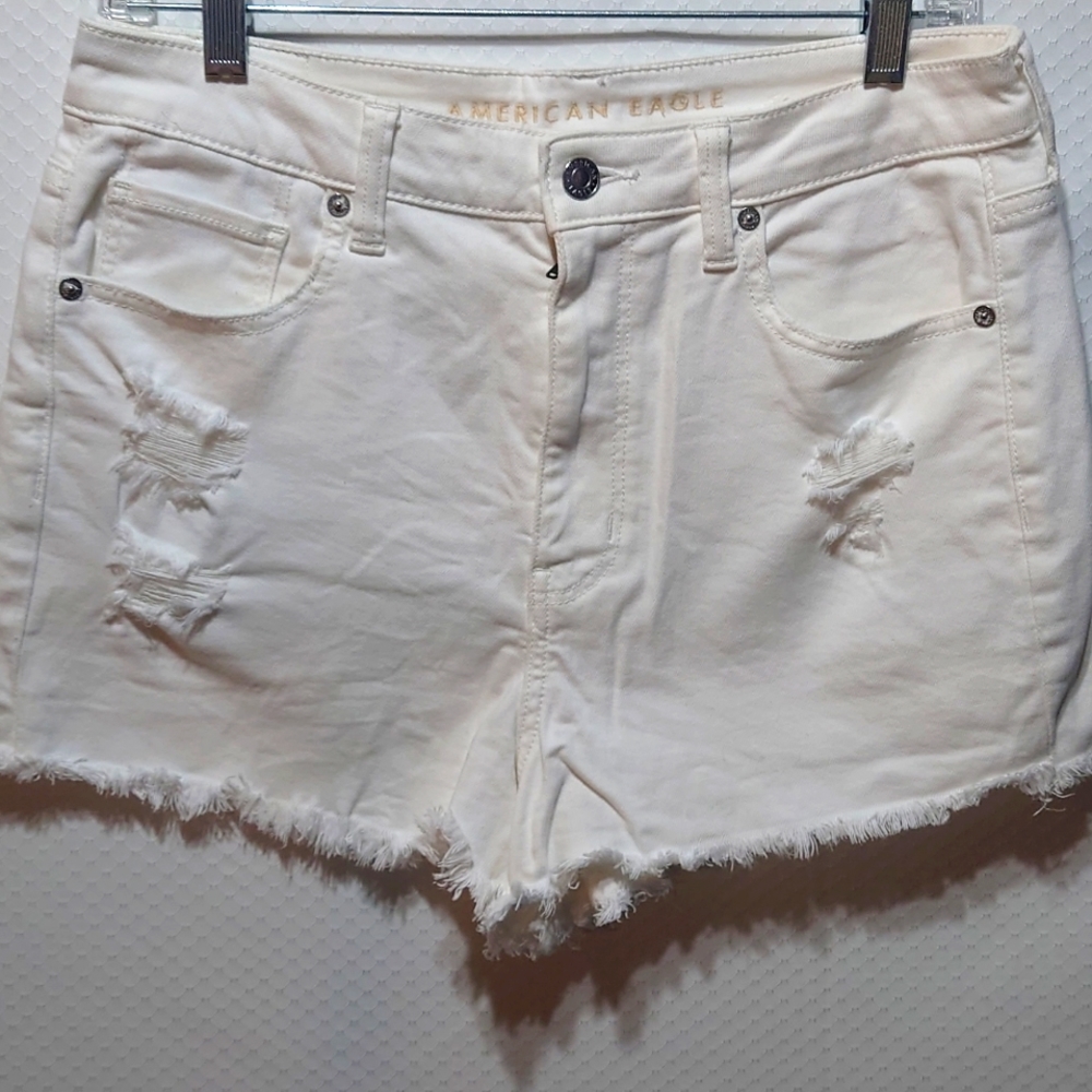 American eagle super stretch white distressed jean shorts. Size 8